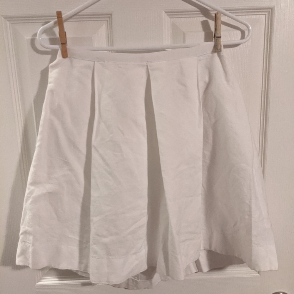 White zip-up pleated tennis skirt